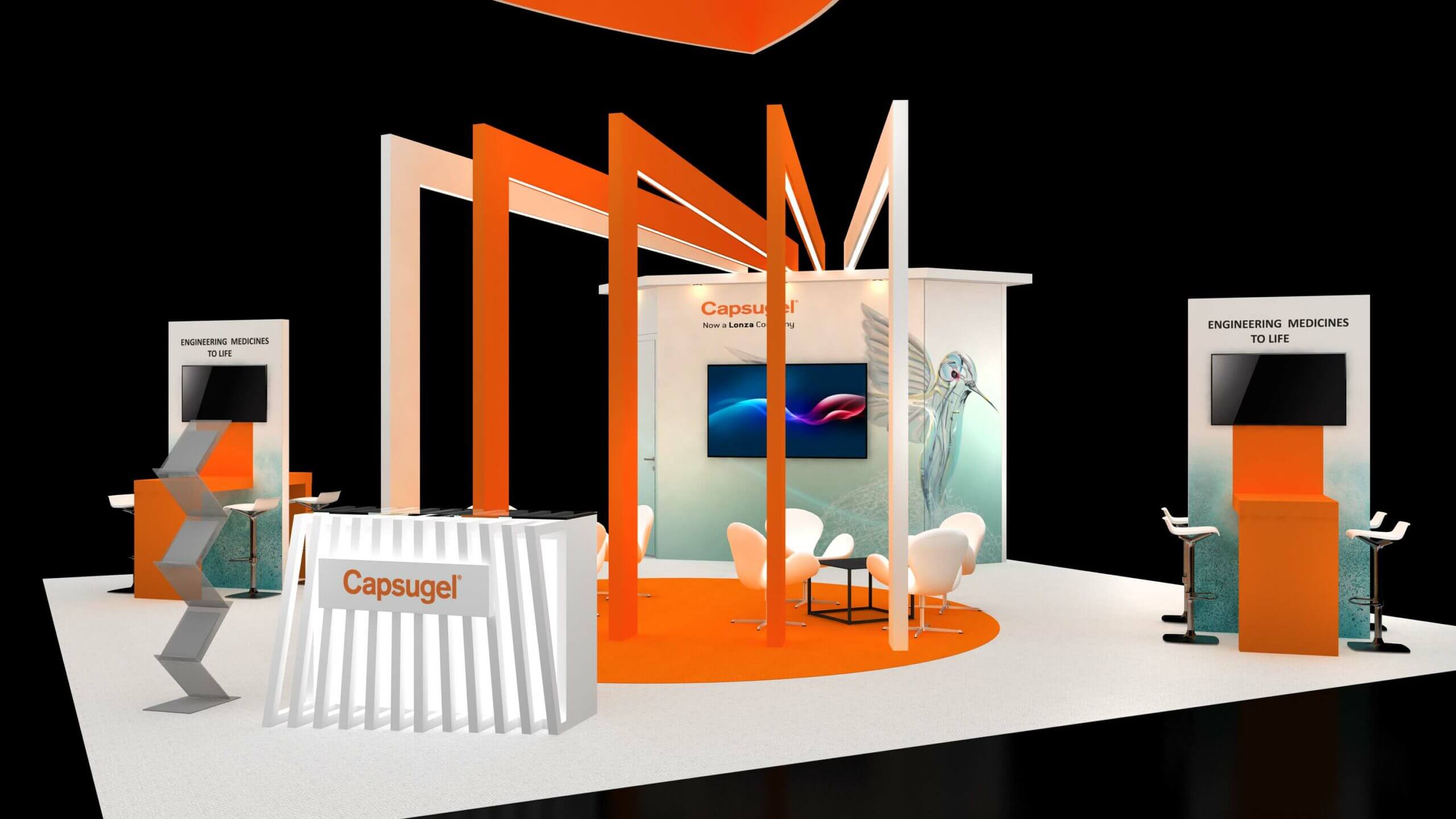 Capsugel booth detail showing a white reception counter, orange framing and freestanding display screens.
