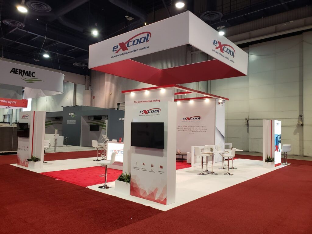 Excool completed booth: a rectangular canopy above multiple freestanding equipment cabinets