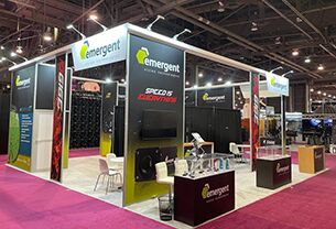 Emergent Vision Technologies completed booth: display panels and screens beneath an open overhead frame