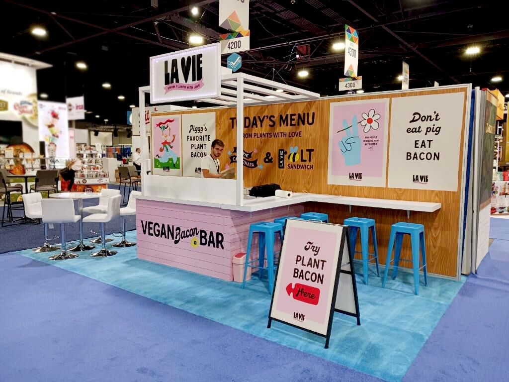 Lavie Foods completed booth: an angled café-style header above a front service counter and menu graphics