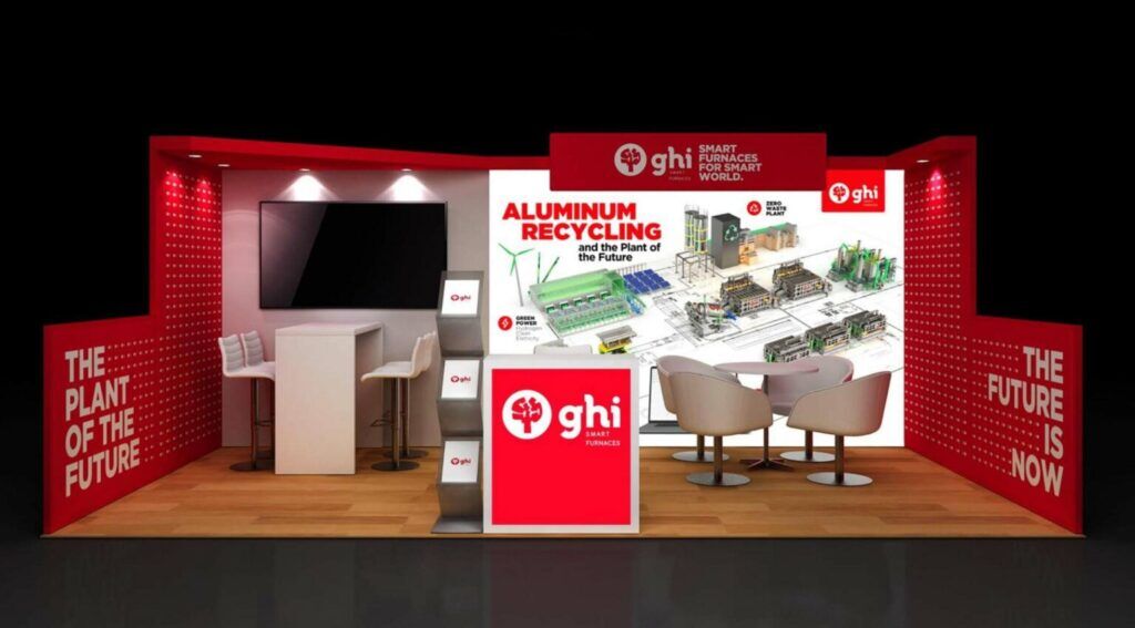 GHI 3D rendering: a graphic back wall behind a reception counter, meeting table and stools