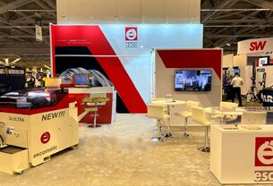 ESCO completed booth: an angled graphic wall beneath a long rectangular hanging sign