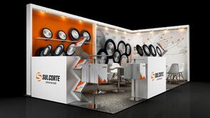 Sulcorte 3D rendering: circular saw-blade displays on the back wall above a counter and meeting table