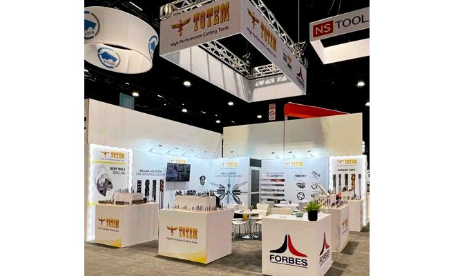 Forbes & Company Limited completed booth: a rectangular hanging sign above product panels and reception counters