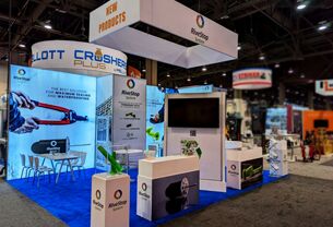 Rivestop completed booth: a rectangular hanging sign above freestanding product panels and a meeting area