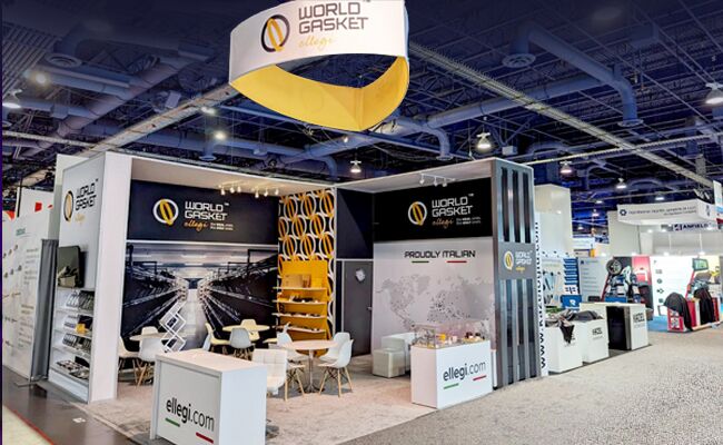 World Gasket Ellegi completed booth: a circular hanging sign above product shelving and display counters